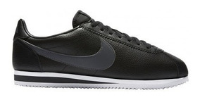 nike cortez negras con dorado