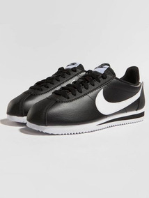 nike cortez negras con dorado