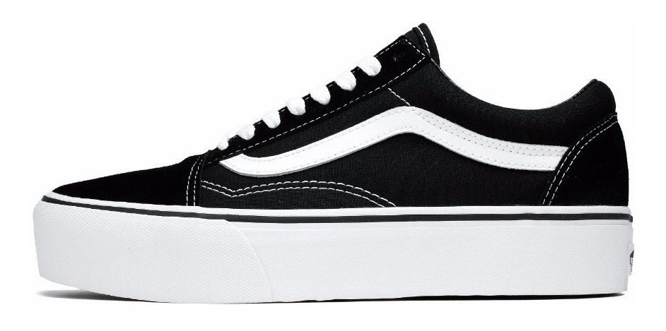 vans negras linea blanca